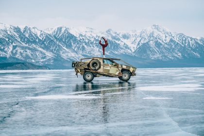 Black SUV Driving on Snow – Car Advertising Image