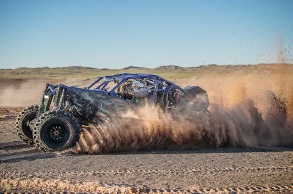 Black Off-Road Vehicle Driving on Terrain – Car Advertising Image