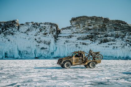 Black SUV Driving on Snow, Candid Moment – Professional Vehicle Photography