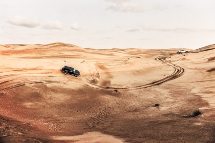 Black SUV on Road, Nature Background – Automotive Photography Portfolio