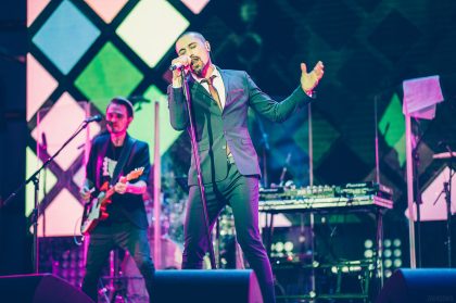 Event Photography, Man on Stage – Corporate Event Photography