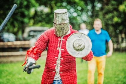 Man with Shield, Event Photography – Business Event Image