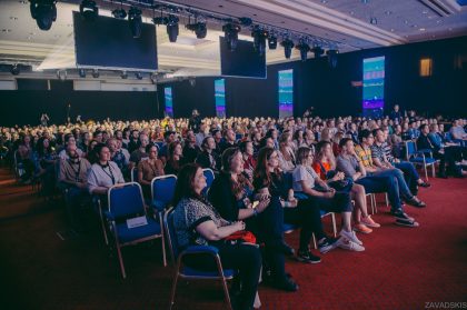 Audience Seated in a Hall – Conference Photography