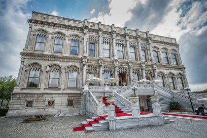 Building Facade with Stairs and Garden, Candid Moment – Architectural Exterior Photography