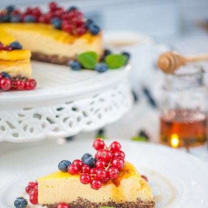Red Strawberries and Berries on a White Surface – Food Photography Portfolio
