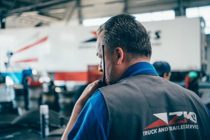 Man with Radio in Industrial Factory Space – Factory Photography