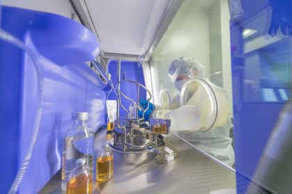 Scientist in Lab Coat, Industrial Environment – Corporate Industrial Image