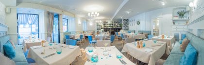 Restaurant Interior: Brightly Lit Tables and Chairs – Modern Design Portfolio