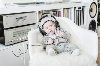Child in Winter Clothes, on a White Background – Family Photography Portfolio