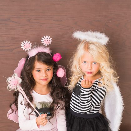 Girl in Pink Dress with White Wings – Natural Children's Photography