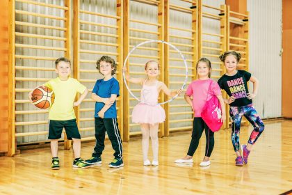 Children's Photography. Children Playing Indoors with Toys – Child Lifestyle Portrait