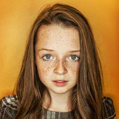 Child Portrait, Warm Tones, Candid Smile – Children's Photography