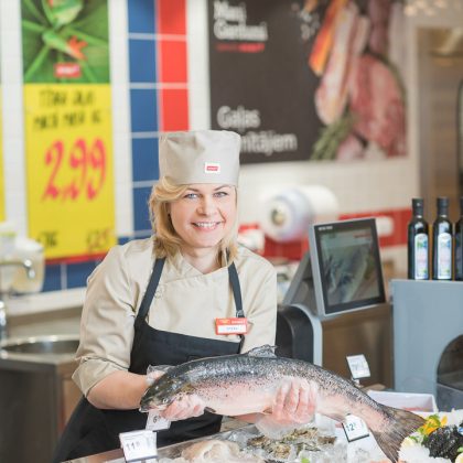Portrait: Woman at Fish Market – Editorial Portrait Image