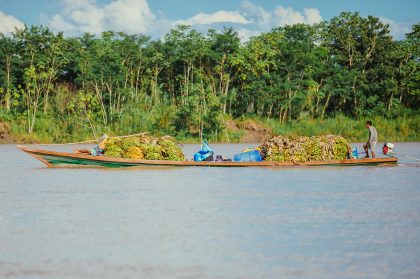 Man in a Boat, Water – Editorial Travel Image