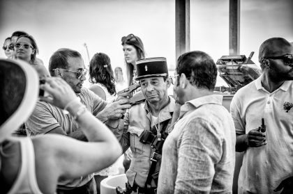 Man with Binoculars, Travel Photography – Editorial Travel Image