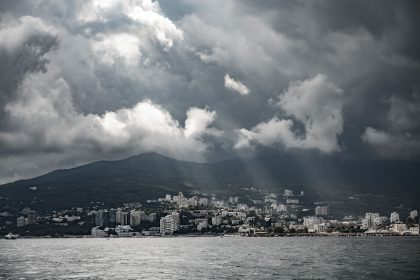 Landscape with City and Mountains in Mist – Editorial Travel Image