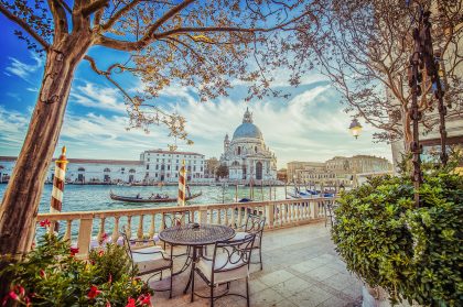 Canal, Boat, and Architecture in Italy – Editorial Travel Image