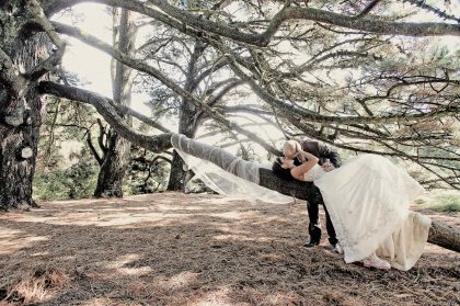 Wedding Photograph: Happy Couple in Garden, Candid Moment – Bride and Groom Photography