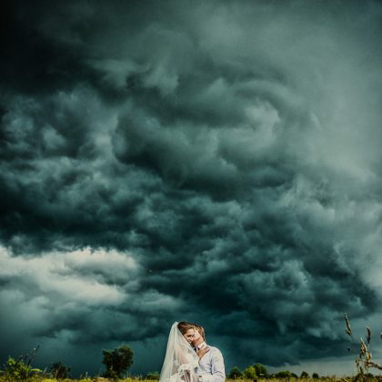 Wedding Photographer: Happy Couple in Summer Field – Bride and Groom Photography