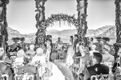 Wedding Ceremony in a Garden, Couple Exchanging Vows – Romantic Wedding Image